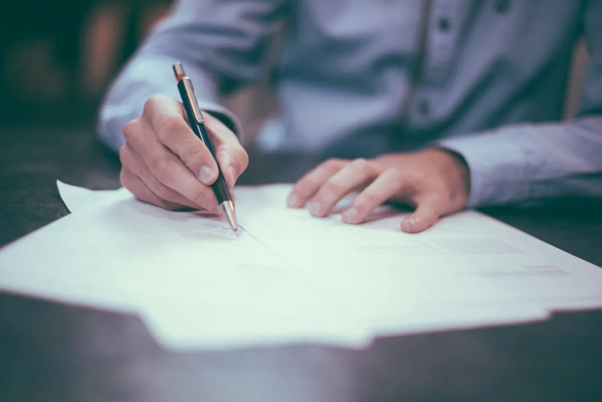 Business professional reviewing colocation contract terms and SLA documentation