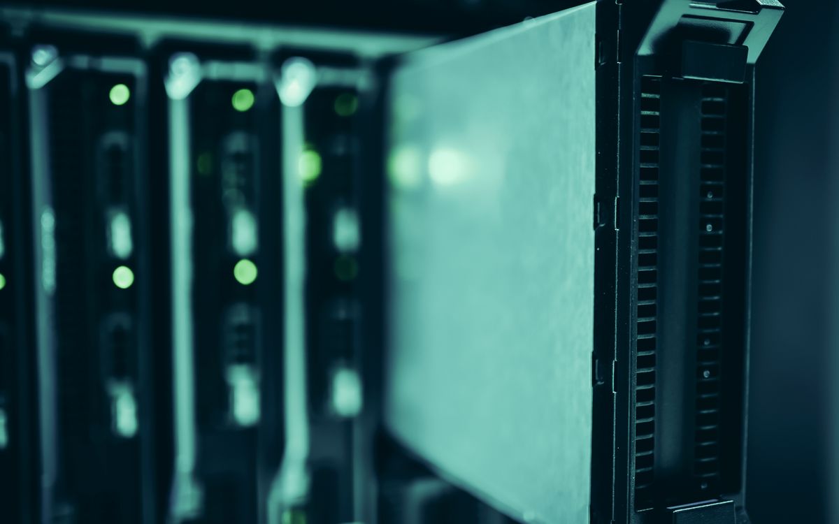 Close-up of server racks in a data center highlighting memory and compute hardware infrastructure for AI workloads
