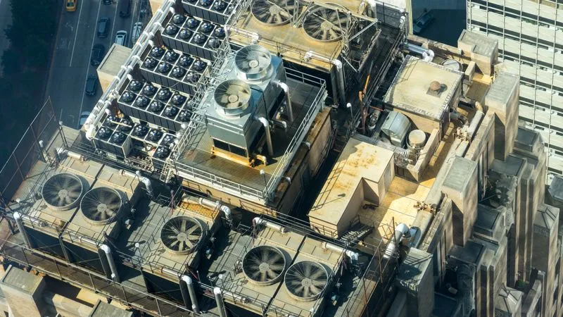 Industrial HVAC and dehumidification systems in a data center facility in a hot humid climate