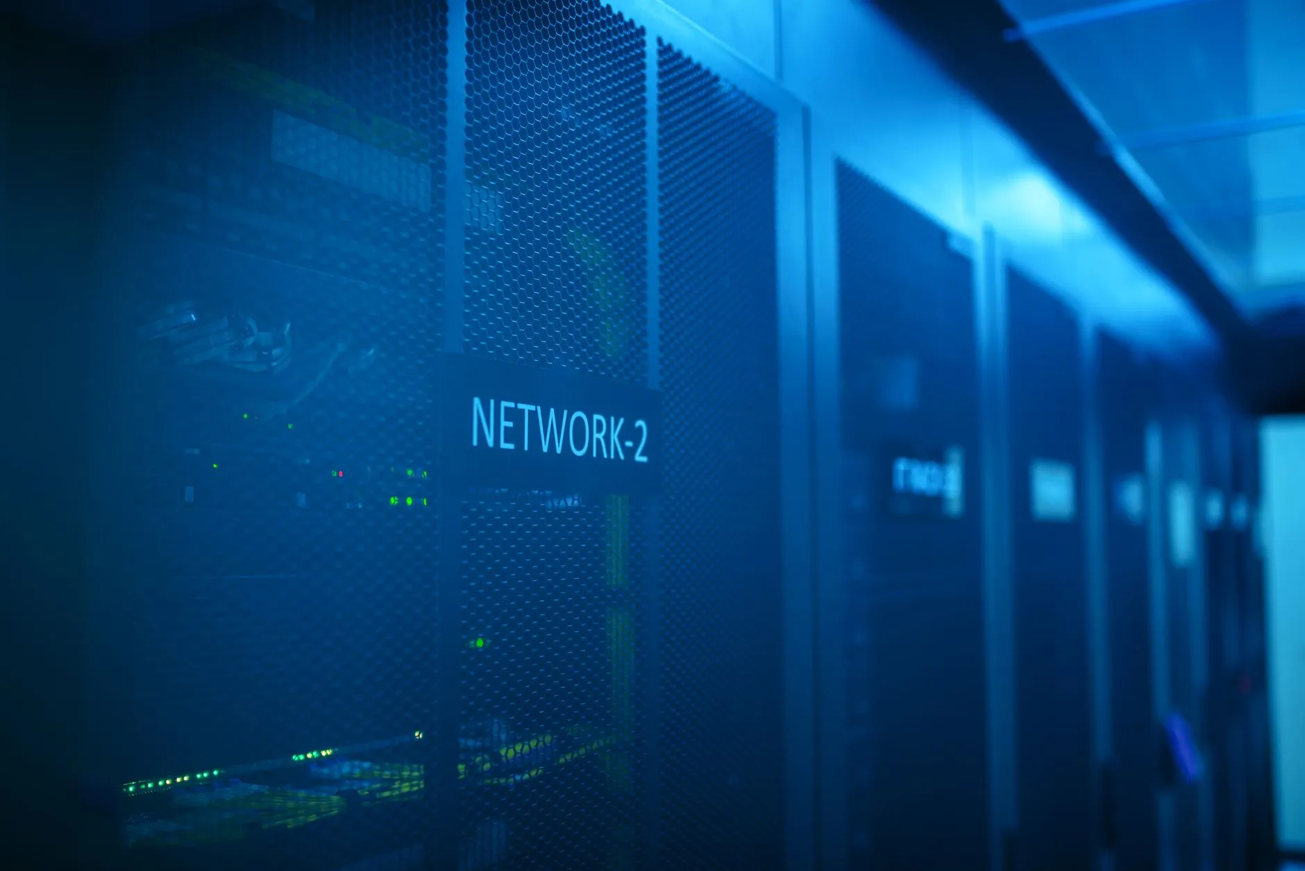 Data center network infrastructure with server racks and network equipment for DDoS protection