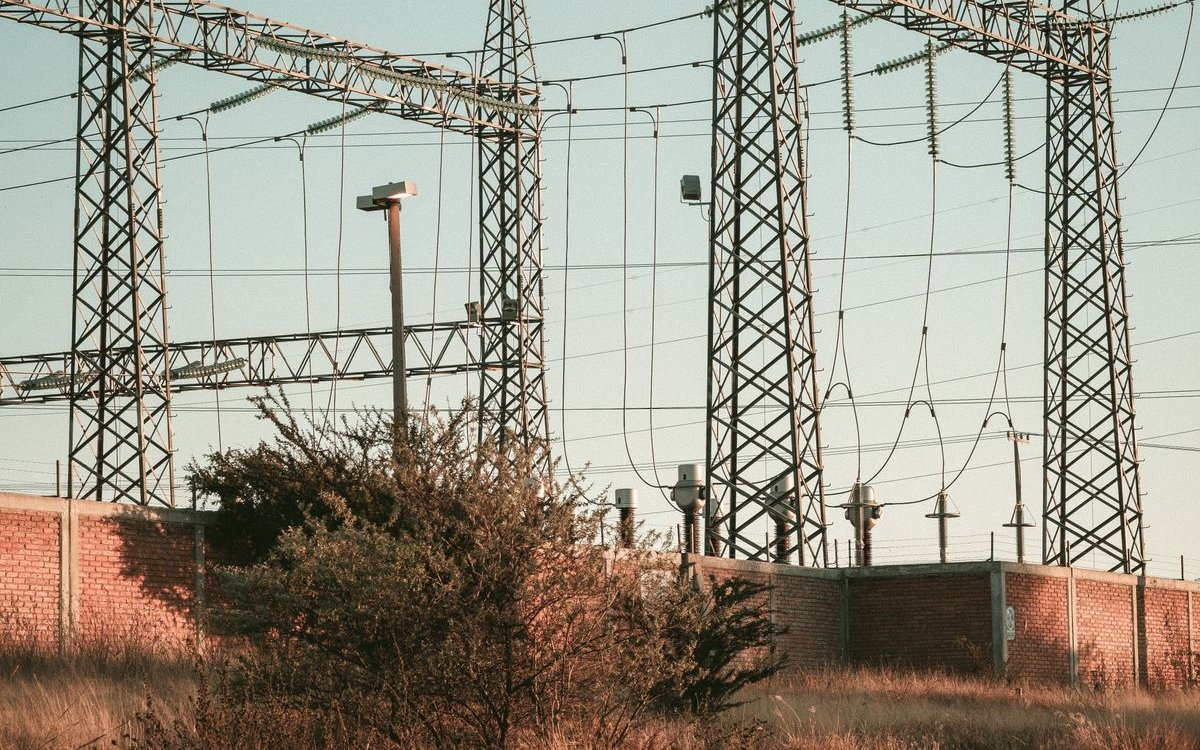 High-voltage transmission towers forming part of the GCC grid interconnection network supplying UAE data centers