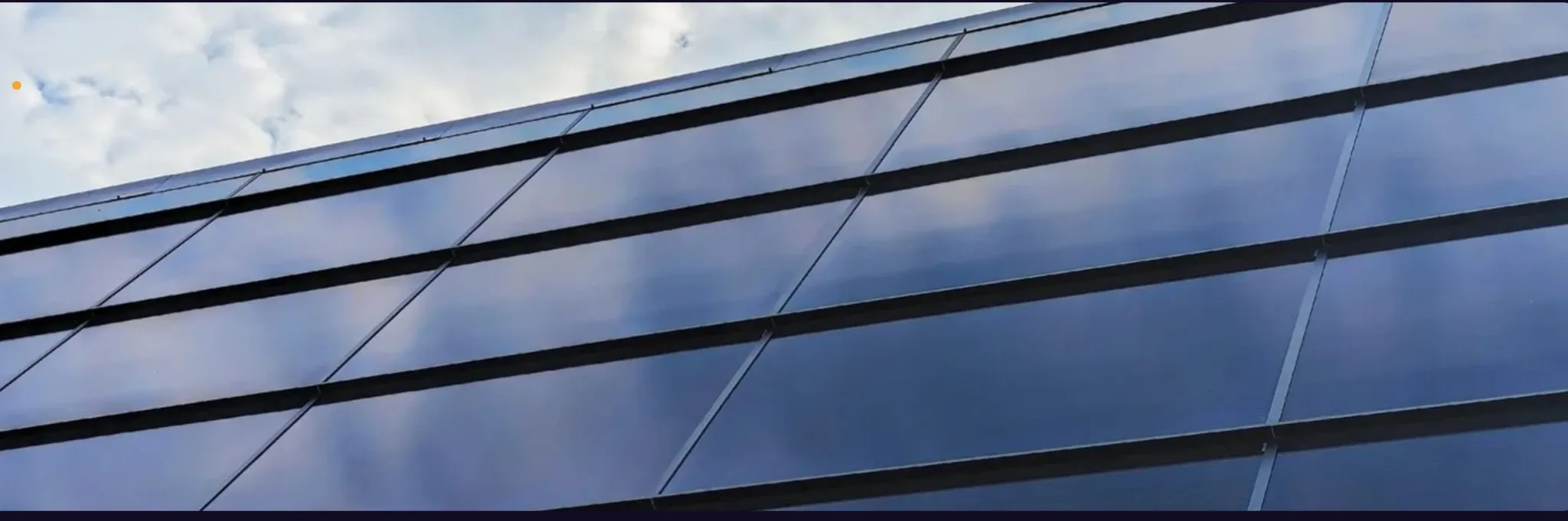 Close-up view of solar shingle cells showing the integrated photovoltaic technology that replaces traditional roofing
