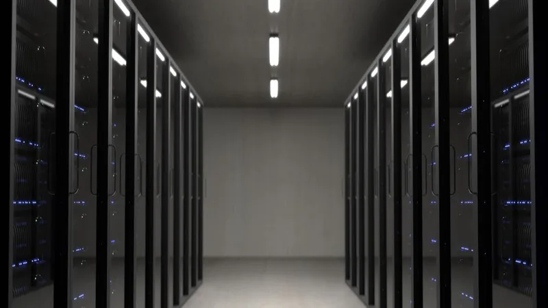 Data center server room with environmental monitoring sensors and LED status indicators on server racks