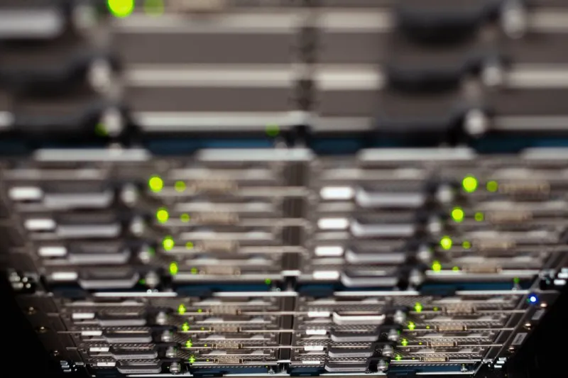 High-density GPU server rack with advanced liquid cooling in a modern AI data center